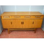 Excellent G-Plan teak dining suite of sideboard, extending dining table and six chairs, 85 cms high,