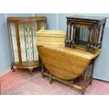 A vintage oak drop leaf dining table, a bow front china cabinet, side tables, pine lidded box etc