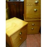 Three modern pine two drawer file cabinets, 59 cms high, 53 cms wide and an entertainment cabinet