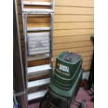A Black & Decker 32mm electric chipper and two sets of step ladders E/T