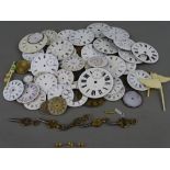 A quantity of antique pocket watch dials and five keys etc