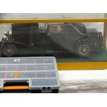 Large scale cased model of a 1932 Rolls Royce Phantom II coupe, a pictorial image of a Rolls Royce