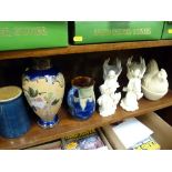 Royal Doulton stoneware baluster vase, a similarly styled jug, two composition angel candleholders