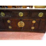 Oriental hardwood sideboard for restoration having rolled ends to the top and with three long