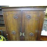 Possibly European wardrobe with carved door front and base drawer