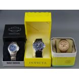 Three boxed designer gent's watches - Fossil, Invicta & Harley Davidson