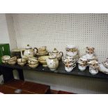 Forty two piece Japanese eggshell porcelain tea service and a twelve place Staffordshire china