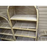 Graduated trio of arched top wicker bookcases