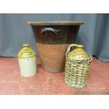 Two stoneware W Jones, Wine & Spirit Merchant flagons and a vintage pottery egg crock