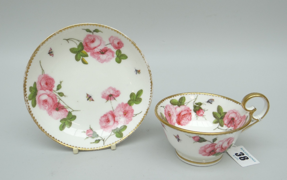 A FINE NANTGARW PORCELAIN BREAKFAST CUP & SAUCER footed and with inverted heart shaped handle,