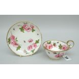 A FINE NANTGARW PORCELAIN BREAKFAST CUP & SAUCER footed and with inverted heart shaped handle,