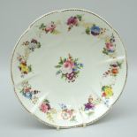 A SWANSEA PORCELAIN CRUCIFORM CIRCULAR DISH finely painted with a centre floral spray of colourful