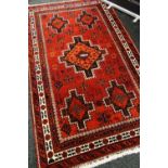 A PERSIAN CARPET from Postkohi, 100% wool pile, 244 x 143cms