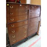 A GOOD PAIR OF MID-CENTURY NARROW CHESTS of seven drawers