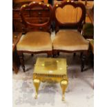 A GOOD C19TH PIERCED BRASS FOOTMAN together with a pair of balloon back dining chairs