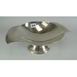 WHITE METAL PROBABLY CONTINENTAL SILVER PEDESTAL BOWL with twin handles in beaten effect