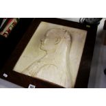 A FRAMED PLASTER RELIEF PORTRAIT entitled 'Amy'