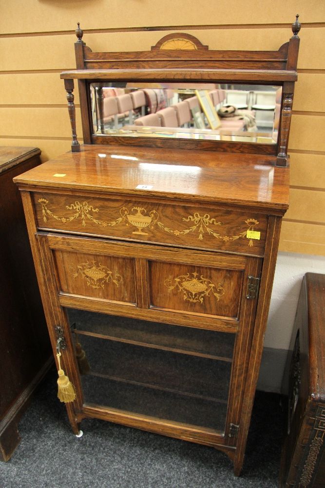 A GOOD EDWARDIAN ROSEWOOD MUSIC CABINET with mirror-back and with single semi-glazed door and