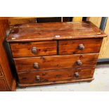 A STAINED PINE CHEST OF TWO-LONG & TWO-SHORT DRAWERS