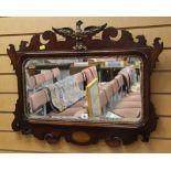 A GOOD ANTIQUE WALL MIRROR having gilded moulded eagle finial and gilded moulded slip with a