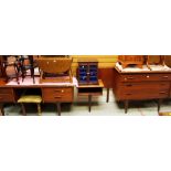A FIVE PIECE MID CENTURY BEDROOM SUITE BY YOUNGER comprising long dressing table, bed ends