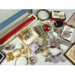 COSTUME JEWELLERY contained within a shoe-box and includes cameo and other bar brooches, bangles,