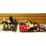 AN ASSORTMENT OF FIREFIGHTER ORNAMENTS INCLUDING Meercats, Beswick figure, novelty teapot and