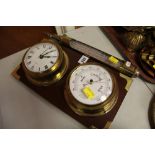 A REPRODUCTION MARITIME STYLE CLOCK AND BAROMETER SET TOGETHER WITH a brass-encased thermometer