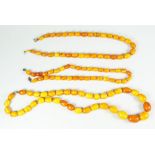 THREE STRINGS OF GRADUATED BUTTERSCOTCH AMBER BEADS, 111g approx.