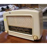 A CREAM COLOURED COSSOR VINTAGE VALVE RADIO