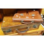 A GOOD VINTAGE TAN LEATHER SUITCASE and a later satchel