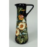 A MOORCROFT POTTERY SLENDER TAPERED JUG limited edition (294/400) unknown pattern signed K