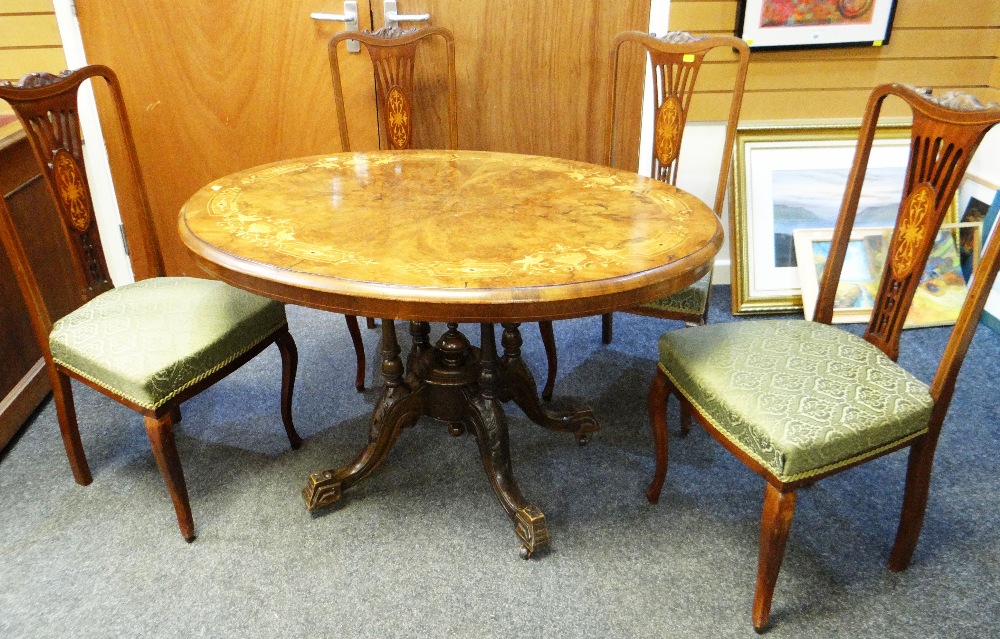 ANTIQUE OVAL MARQUETRY BREAKFAST TABLE together with four antique inlaid mahogany dining chairs