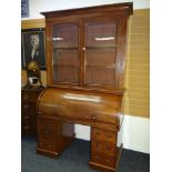 LATE-VICTORIAN MAHOGANY CYLINDER BOOKCASE BUREAU, the base with bank of six drawers to two
