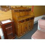 FRENCH 19TH CENTURY STAINED PINE DRESSER, the cupboard base with twin paneled doors, three middle