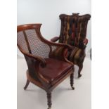 VICTORIAN SHAPED AND CARVED MAHOGANY BUTTON-BACK DRAWING ROOM CHAIR in multi-coloured striped