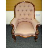 VICTORIAN FRAMED BUTTON BACK SPOON SHAPED CHAIR of serpentine and carved form in pink floral tiled