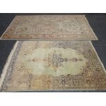 MAINLY FAWN GROUND PERSIAN WOOLEN RUG with centre floral pattern surrounded by birds and flowers and