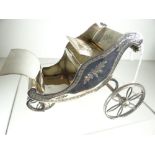 EPNS MODEL OF AN EDWARDIAN BATH-CHAIR with bright cut floral decoration, believed to be in the