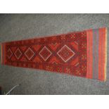 MESHWANI RUNNER in red and blue ground stripe and geometric pattern, 250 x 62cms