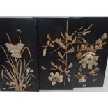 SET OF THREE JAPANESE MEIJI PERIOD IVORY AND BONE COLLAGES, floral studies on black lacquer