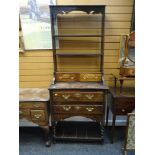 SMALL TURN-OF-THE-CENTURY OAK BARLEY-TWIST DRESSER having a cavity boarded base below long