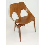 MID-CENTURY 'JASON' CHAIR BY CARL JACOBS FOR KANDY, in plywood, having shaped bent-wood tub-type