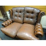 SMALL BROWN LEATHER TWO SEATER CLUB-STYLE WING BACK SOFA