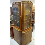 PAIR OF REPRODUCTION MAHOGANY STANDING CORNER CABINETS with glazed and shelved top, cupboard base,