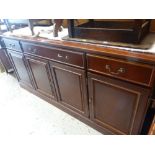 MODERN DARK WOOD SIDEBOARD three drawers above a four door cupboard base, 163cms wide