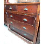 VINTAGE MAHOGANY CHEST with three long and two short drawers and a brushing slide