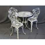 A 70 CM DIAMETER CAST METAL GARDEN TABLE with three chairs (for restoration)