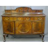 A MAHOGANY RAIL BACK SIDEBOARD with pie crust detail, two drawers over three base cupboards with