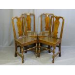 A SET OF FOUR WELL COLOURED OAK COUNTRY CHAIRS with shaped centre splats on turned and block